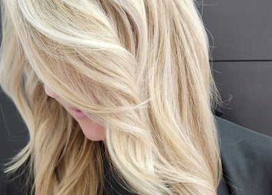 Elegant blonde hair styled at B Fierce Salon Barbados in Deanes, Saint James BB.