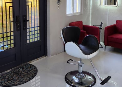 Chic interior of B Fierce Salon Barbados in Deanes, Saint James, featuring modern decor and inviting seating.