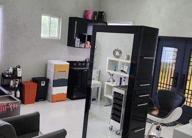 Modern salon interior at B Fierce Salon Barbados, Deanes, Saint James, BB. Features stylish chairs and mirrors.