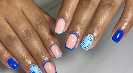 Stylish blue and nude nail art design at Leetalia nails & beauty, Randburg, Gauteng, ZA.
