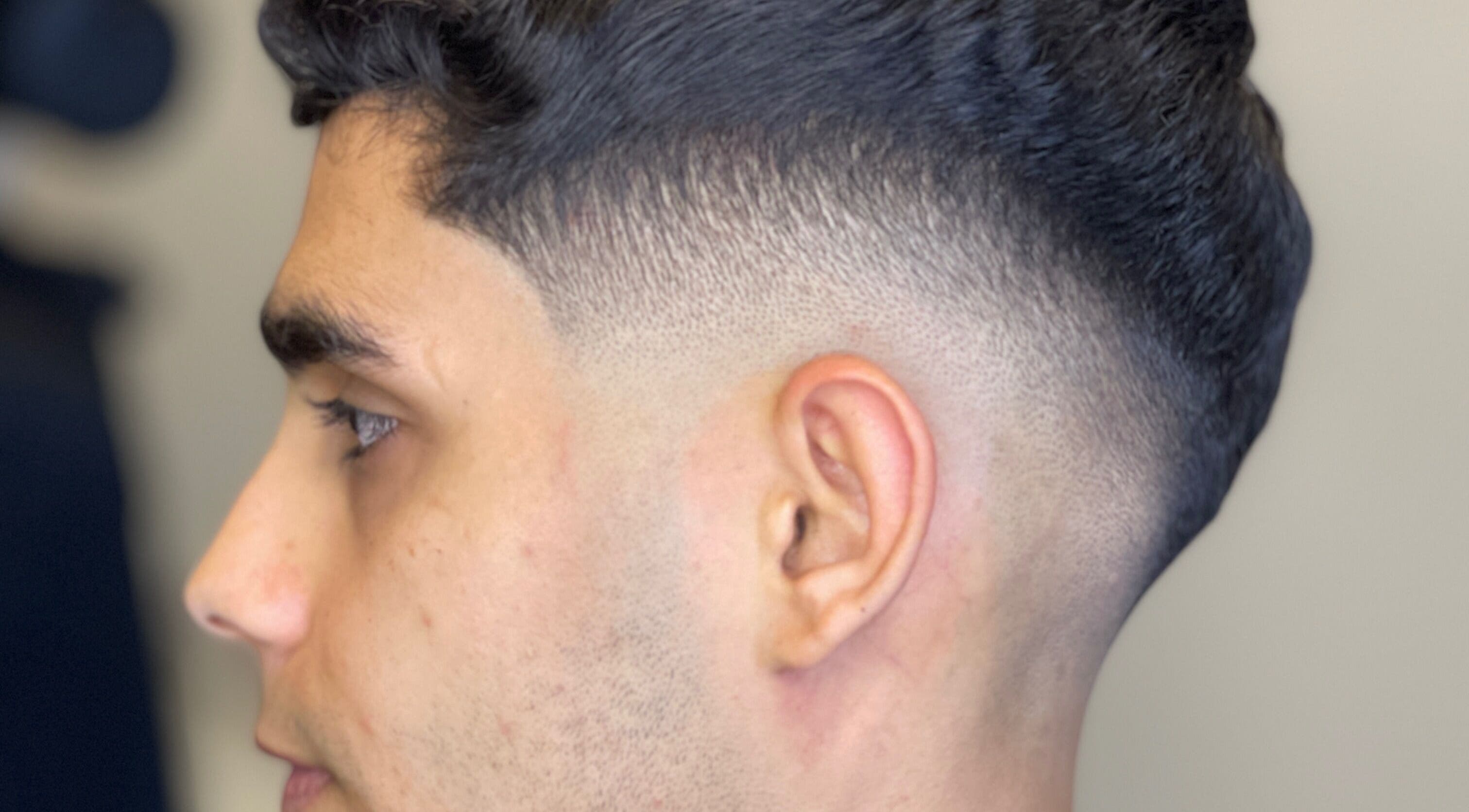 Close-up of a sleek fade haircut at Omar Alaseer, Amman, Amman Governorate, JO.