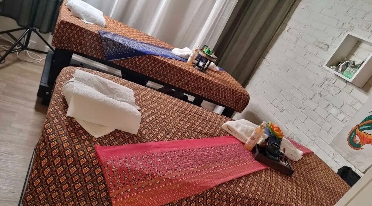 Relaxing massage beds at Reiya Thai Massage in Auckland, Auckland, NZ, featuring traditional Thai decor.