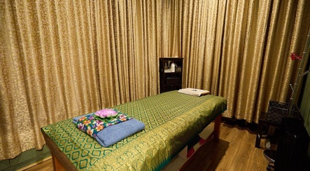 Massage room at Chabaa Thai & Remedial Massage, Surry Hills, New South Wales, AU, featuring elegant décor.