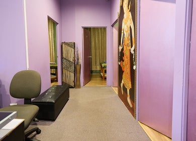 Peaceful hallway at Chabaa Thai & Remedial Massage, Surry Hills, New South Wales, AU, with purple walls and decor.