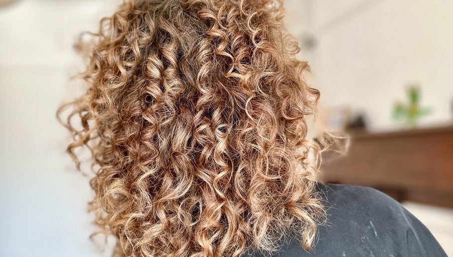 Elegant curly hairstyle crafted at Little Things Hair & Beauty, Heswall, England, GB.