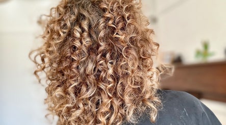 Elegant curly hairstyle crafted at Little Things Hair & Beauty, Heswall, England, GB.