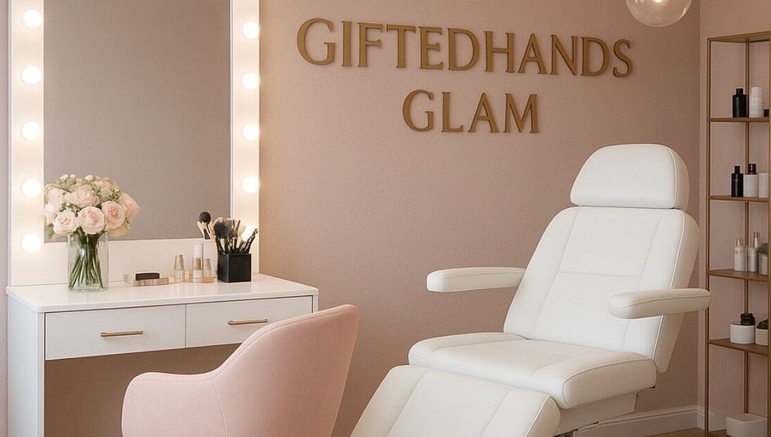 Elegant beauty salon interior at Gitedhands Glam, Beckenham, England, GB with white chair and vanity mirror.