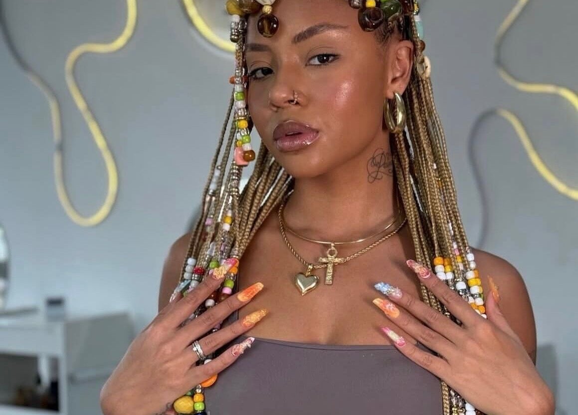 Stylish braided hair and nail art at Gitedhands Glam in Beckenham, England, GB.