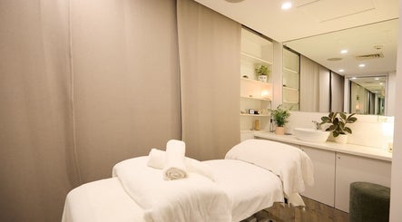 Tranquil massage room at Elena Massage Therapist in Paddington, New South Wales, AU, featuring cozy ambiance.