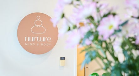 Elena @Nurture Mind & Body Centre logo with flowers in Paddington, New South Wales, AU.