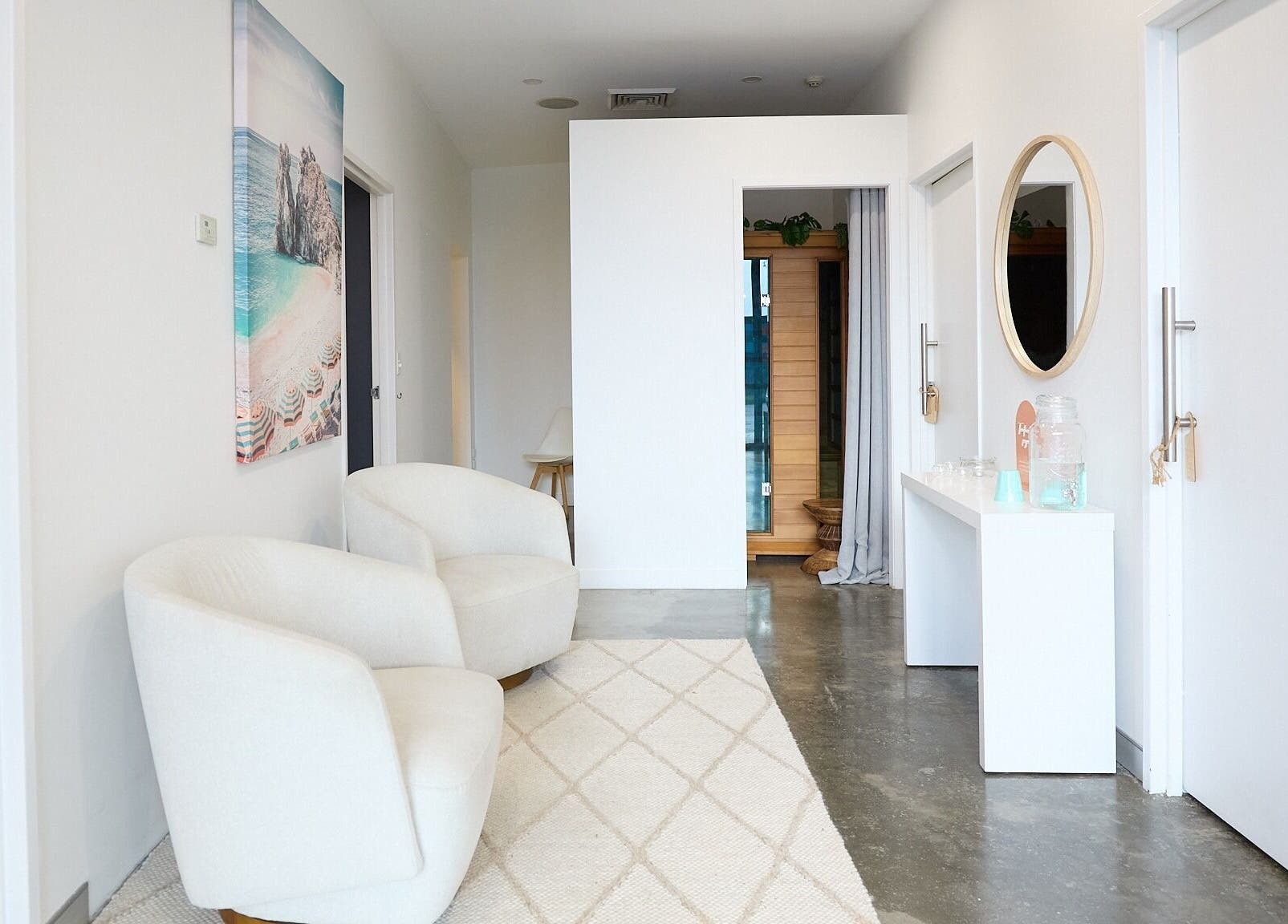 Elena Massage & Bodywork serene lounge area in Paddington, New South Wales, AU with chic decor.