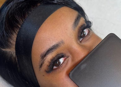 Close-up of professional eyelash extensions at Lashed By Xio, London, England, GB showcasing detailed craftsmanship.