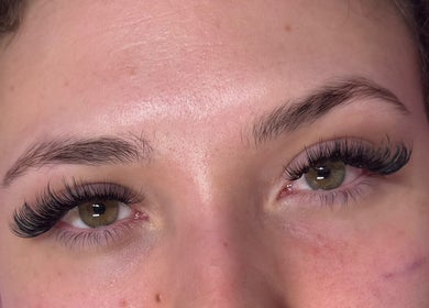Close-up of lash extensions by Lashed By Xio in London, England, GB, showcasing detailed workmanship.