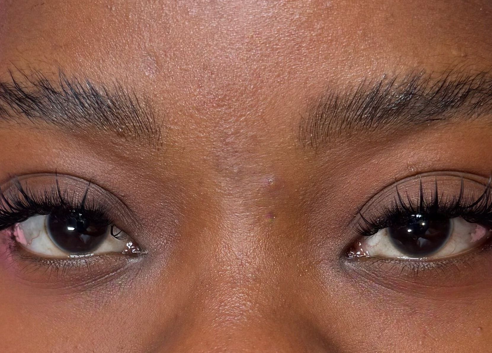 Close-up of expertly done lashes at Lashed By Xio, London, England, GB, showcasing lash artistry.