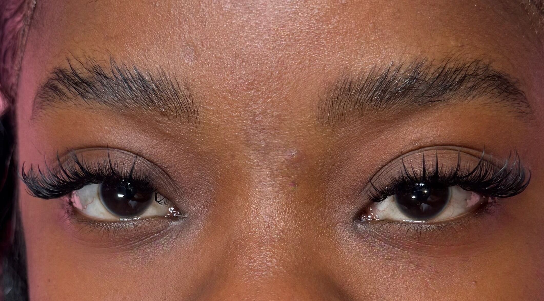 Close-up of expertly done lashes at Lashed By Xio, London, England, GB, showcasing lash artistry.