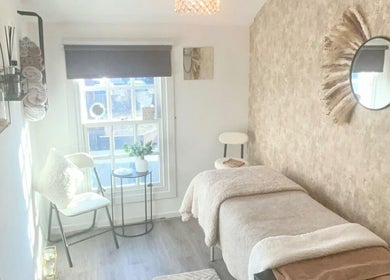 Cozy treatment room at Serenity beauty & aesthetics, Heywood, England, GB with serene decor and soft lighting.