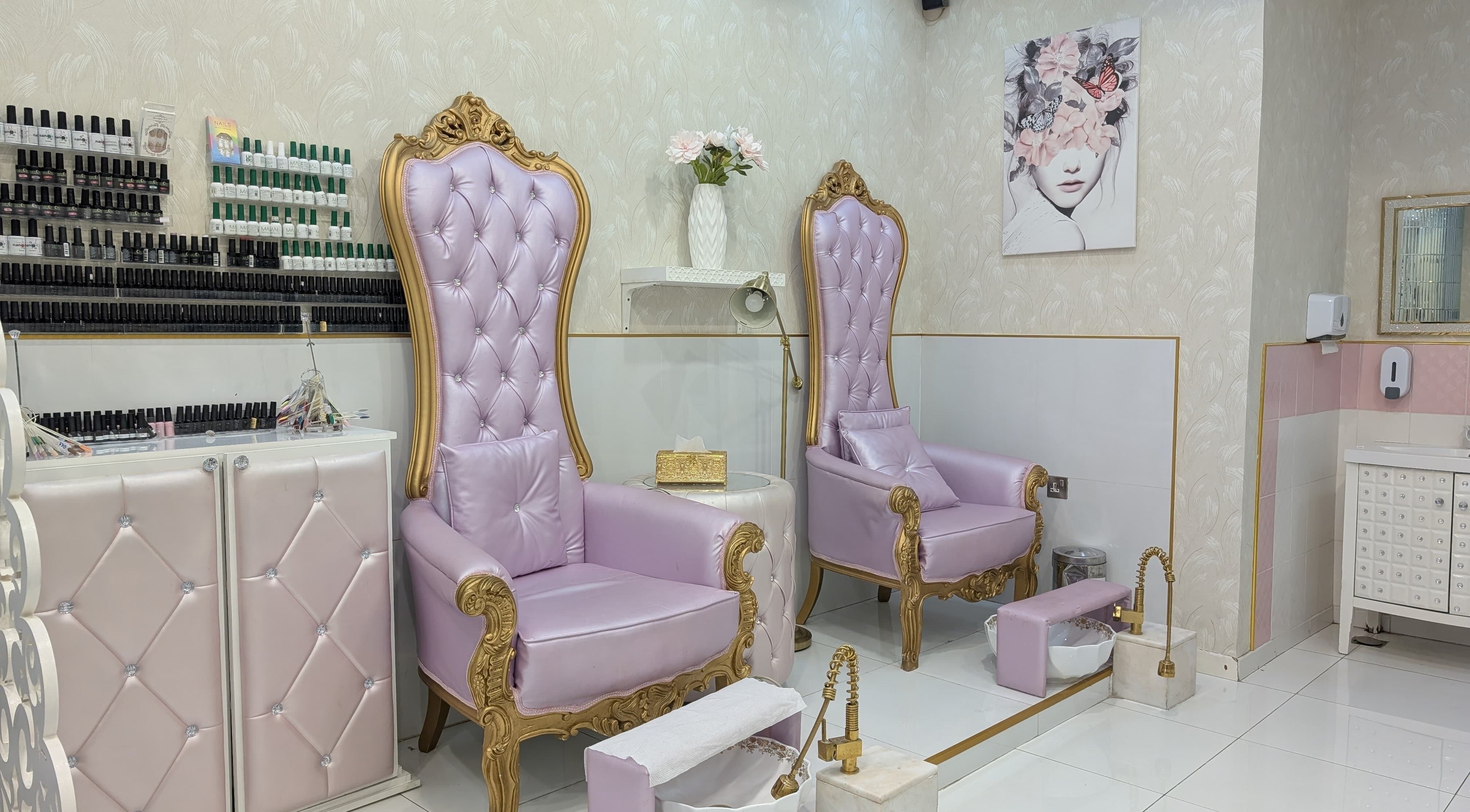 Luxurious purple chairs at Zulya Beauty Salon in Dubai, AE, showcasing elegance and comfort with gold accents.