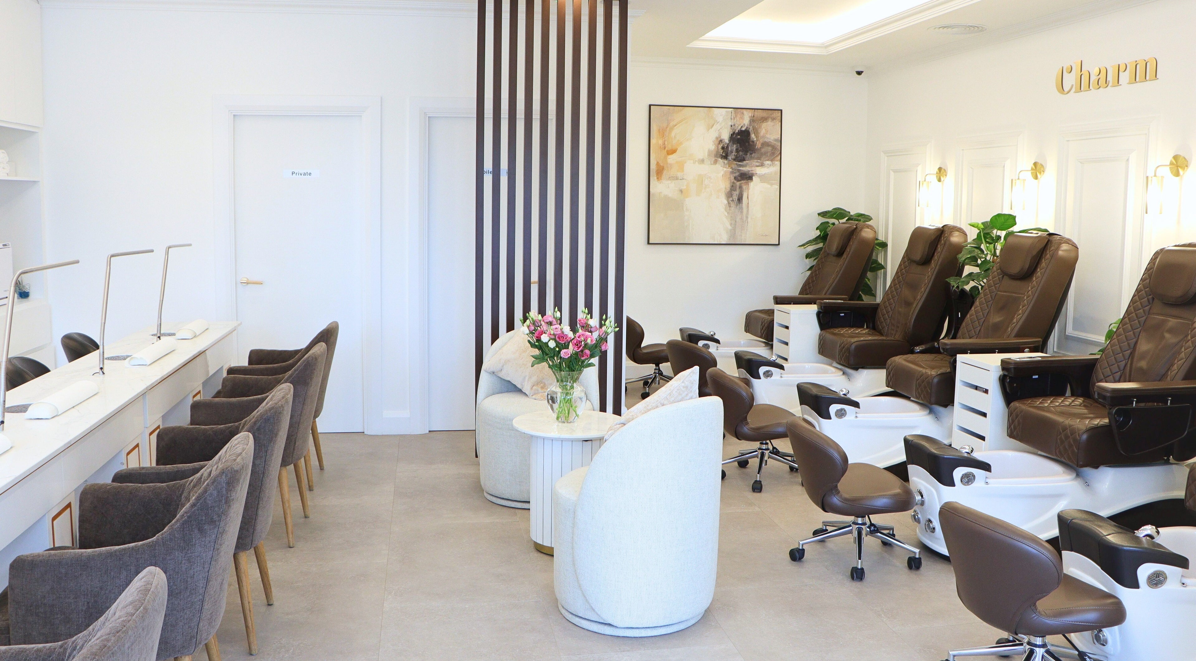 Interior of Charm of Howth in Dublin, County Dublin, IE featuring plush chairs and elegant decor.