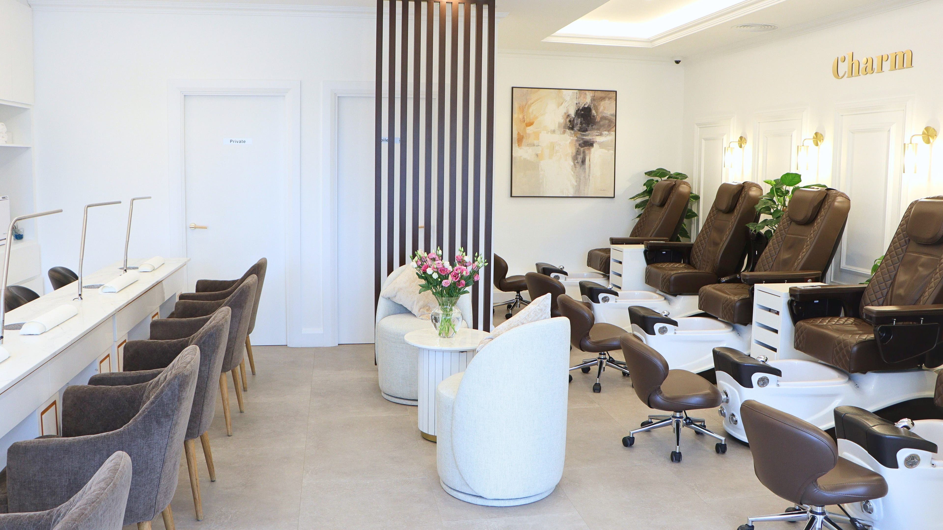 Interior of Charm of Howth in Dublin, County Dublin, IE featuring plush chairs and elegant decor.