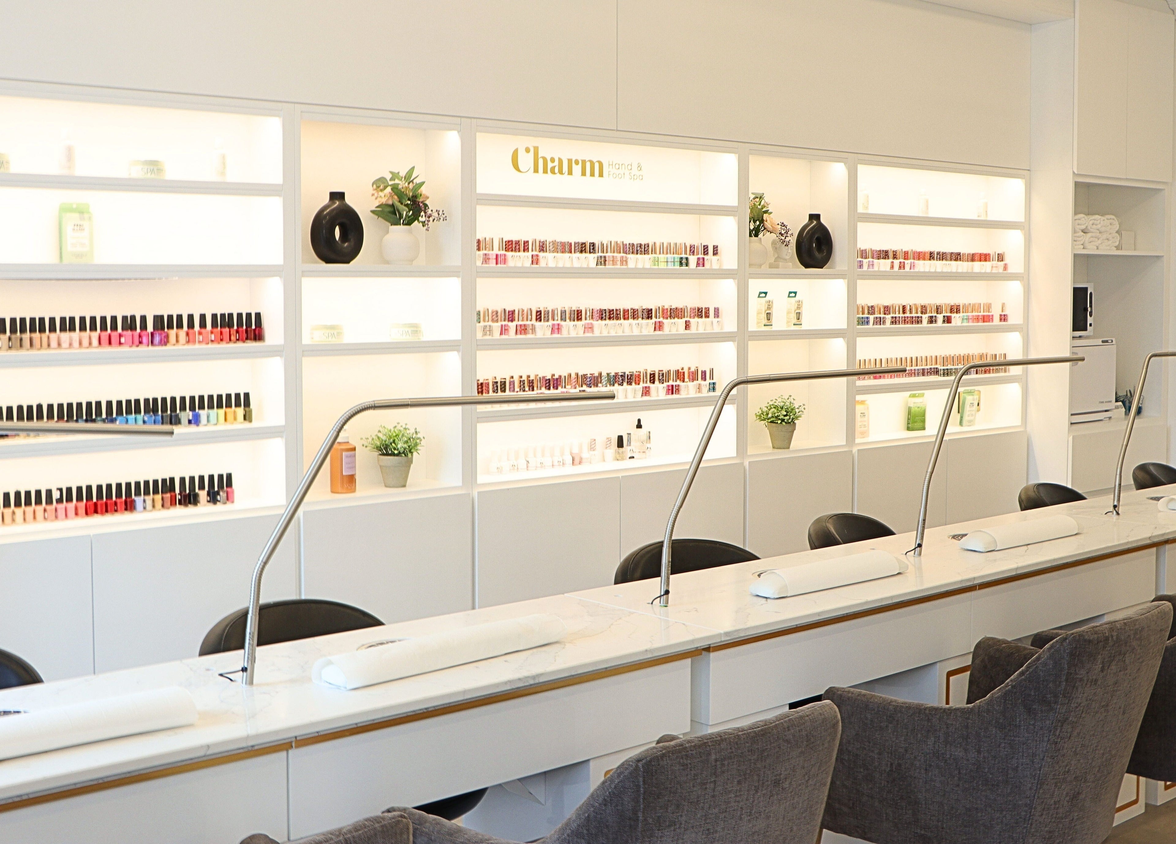 Sleek nail bar at Charm of Howth in Dublin, County Dublin, IE with vibrant nail polish selection.
