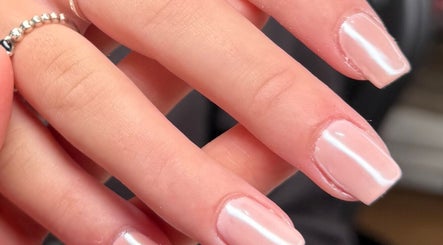 Elegant pale pink manicure by Libby Murphy in Liverpool, England, GB showcasing meticulous nail design.