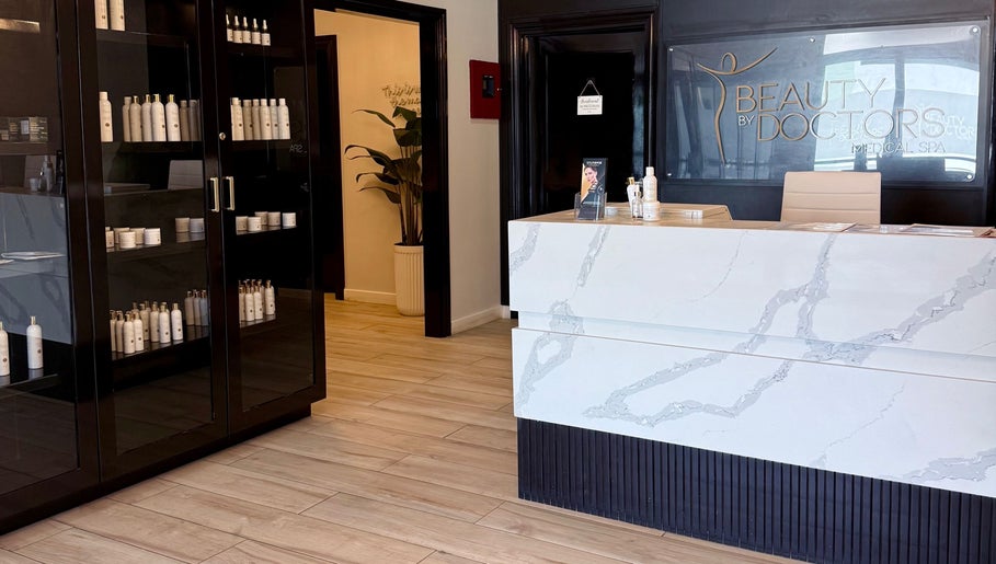Reception area of Beauty By Doctors Medical Spa in Montego Bay, St. James Parish, JM showcasing product display.