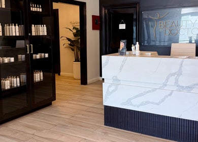 Reception area of Beauty By Doctors Medical Spa in Montego Bay, St. James Parish, JM showcasing product display.