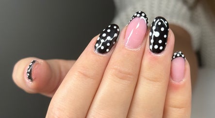 Polka dot nail art in black and white by Nailedbygeorgina, Queensbury, England, GB.