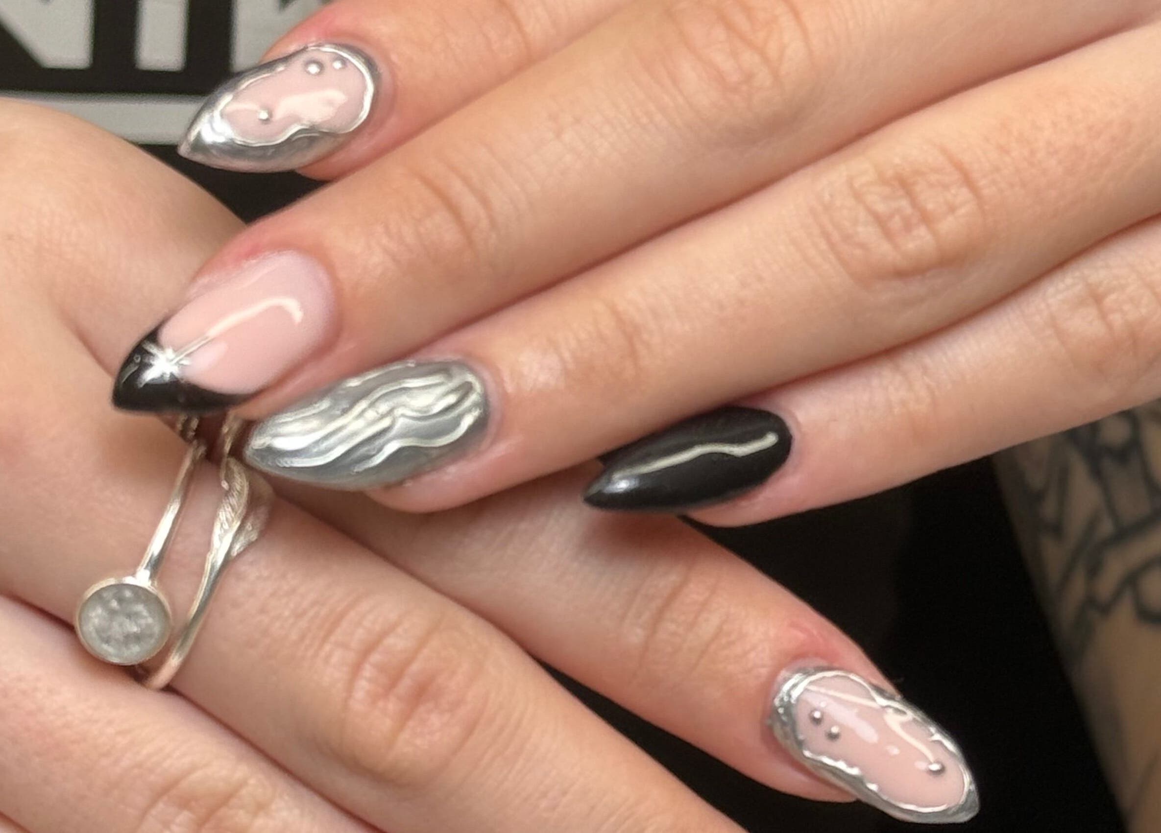 Stylish black and pink nail design at Nailedbygeorgina, Queensbury, England, GB.