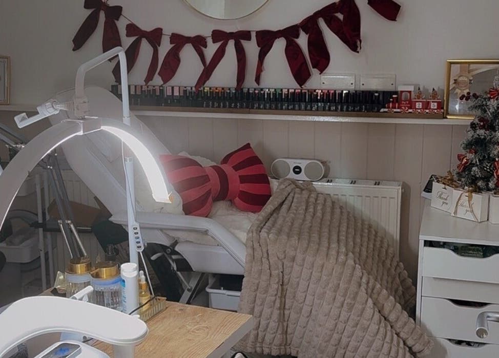 Charming decor at Nailedbygeorgina, Queensbury, England, GB, showcasing a nail station with festive touches.