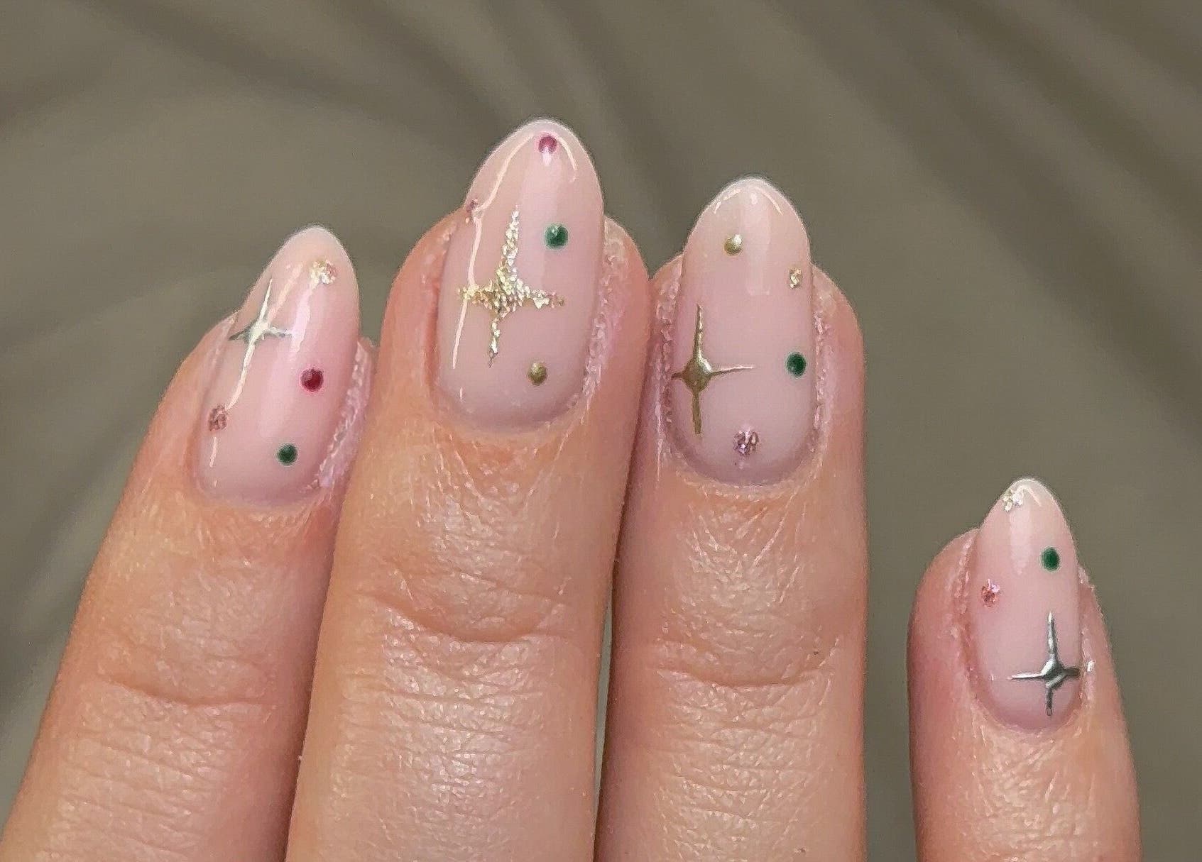 Elegant starry nail art by Nailedbygeorgina in Queensbury, England, GB. Perfect for chic style.