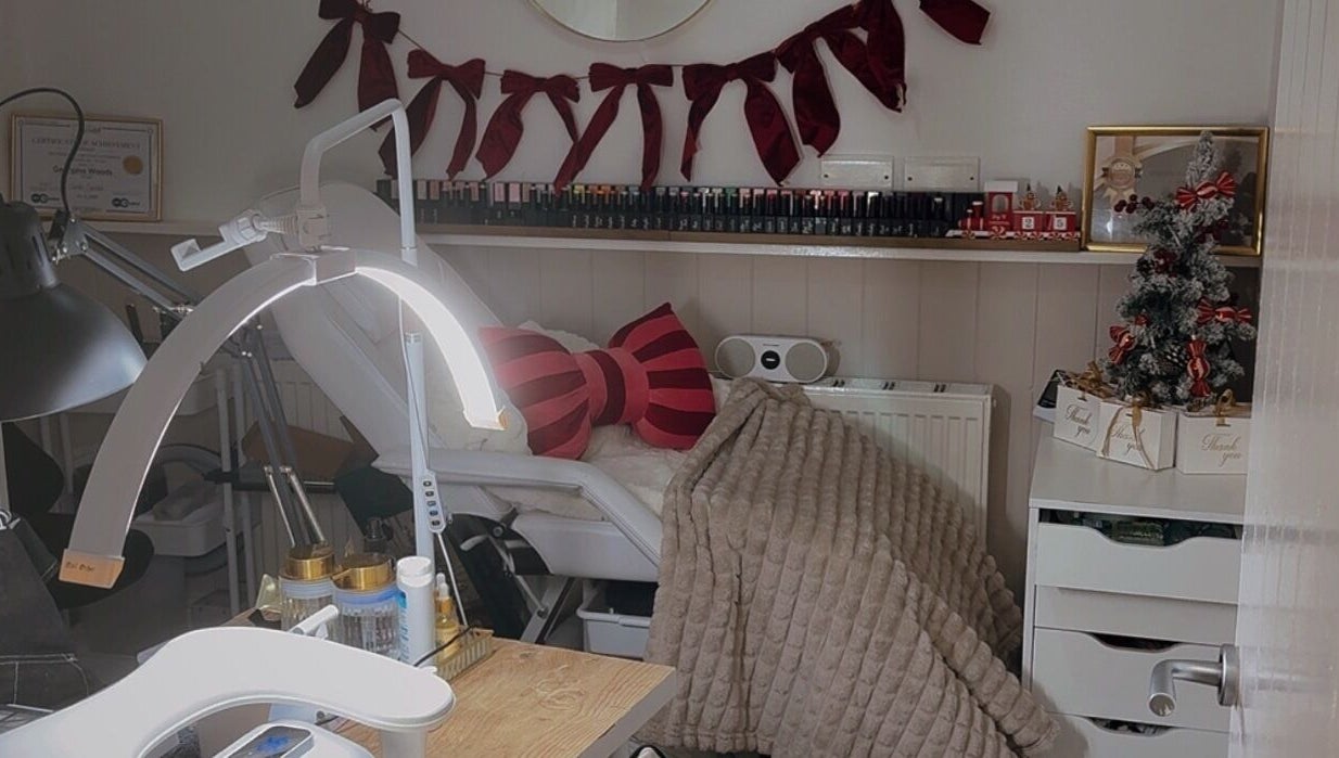 Nailedbygeorgina's welcoming nail station in Queensbury, England, GB, with comfy seating and festive decor.