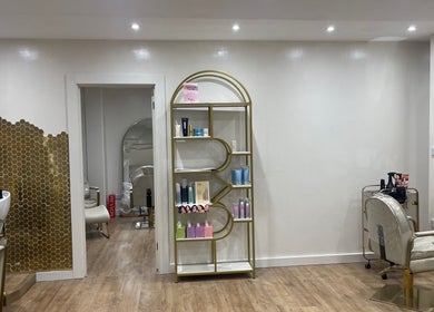 Chic interior of Beauty With Raye in Bristol, England, GB featuring stylish decor and salon chairs.