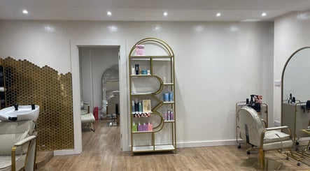 Chic interior of Beauty With Raye in Bristol, England, GB featuring stylish decor and salon chairs.