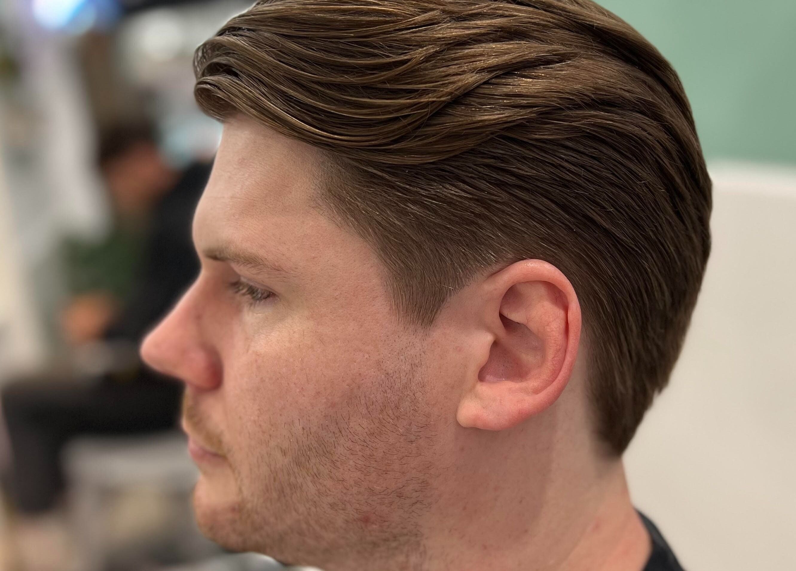 Modern men's haircut at Freshwater Barbers, Southbank, Victoria, AU, showcasing expert styling.