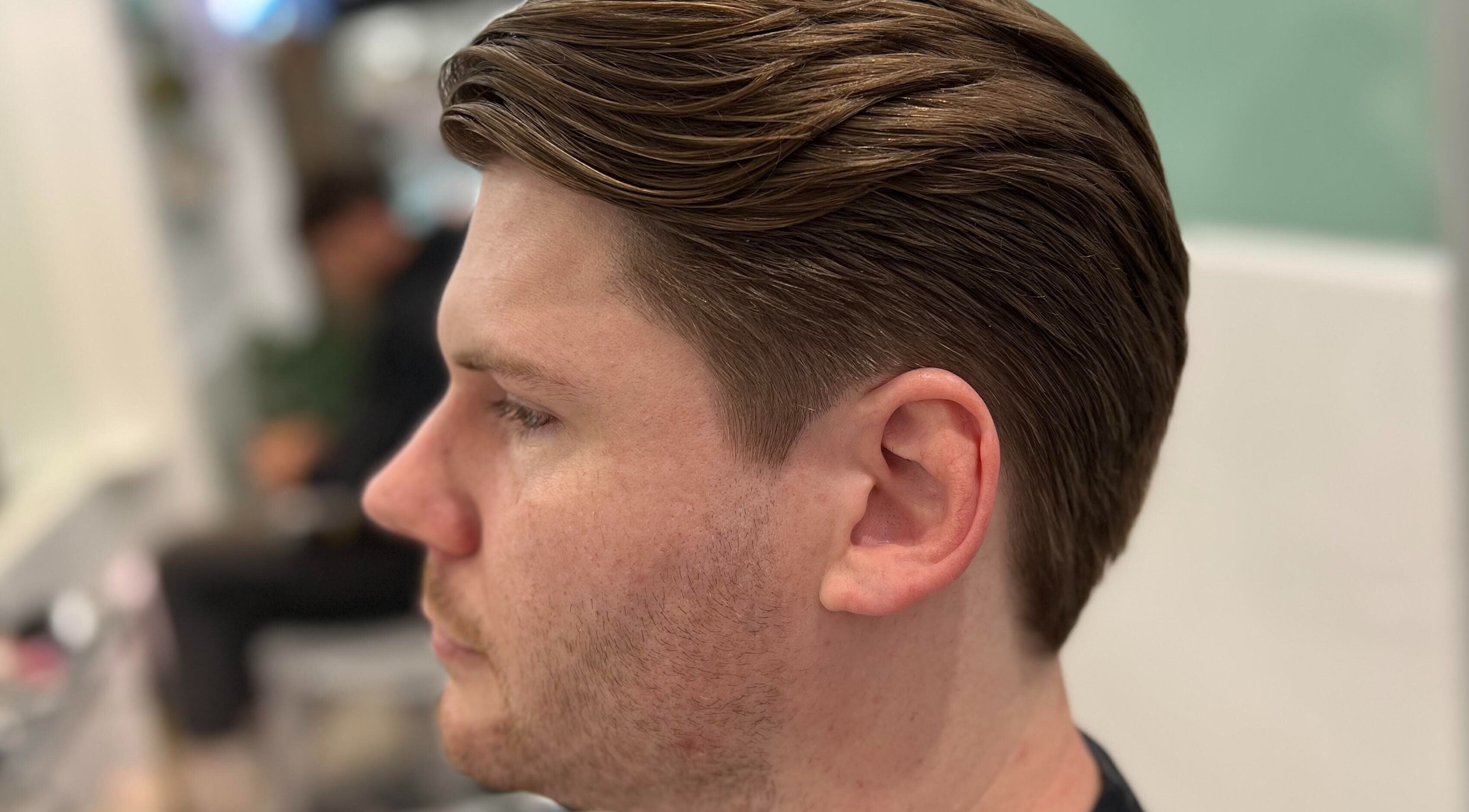 Modern men's haircut at Freshwater Barbers, Southbank, Victoria, AU, showcasing expert styling.