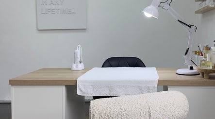 Clean treatment desk at Mika Beauty, Wilmslow, England, GB, ready for beauty and wellness services.