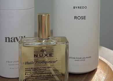 Luxurious beauty products at Mika Beauty, Wilmslow, England, GB, including Nuxe oil and premium lotions.