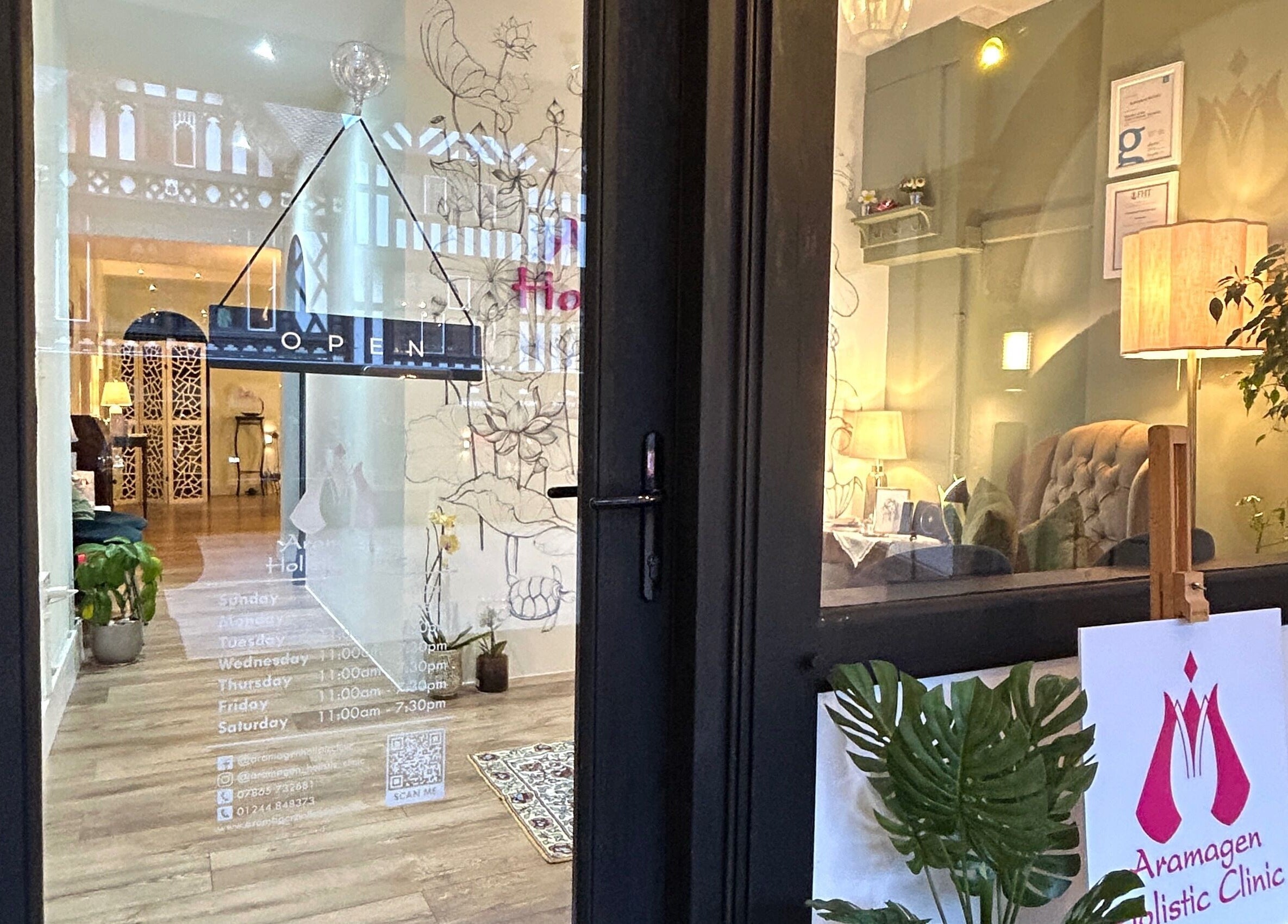 Entrance view of Aramagen Holistic Clinic in Chester, England, GB, showcasing inviting interiors and decor.