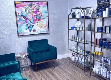 Modern lounge at Bare Lacquer Scottsdale with art and beauty products, located in Scottsdale, Arizona, US.