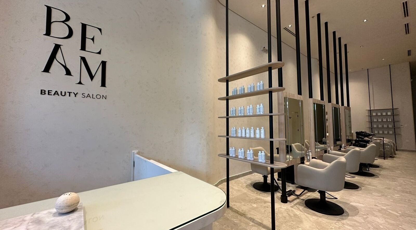 Elegant Beam Beauty Salon interior in جدة, Makkah Province, SA featuring sleek design and seating.