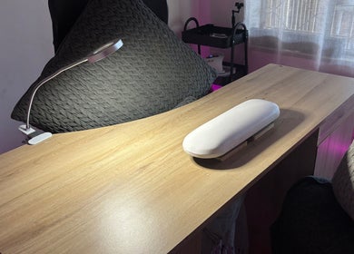 A modern nail station at Blom's Beauty Bar, Boksburg, Gauteng, ZA with sleek design and ambient lighting.