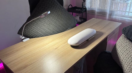 A modern nail station at Blom's Beauty Bar, Boksburg, Gauteng, ZA with sleek design and ambient lighting.