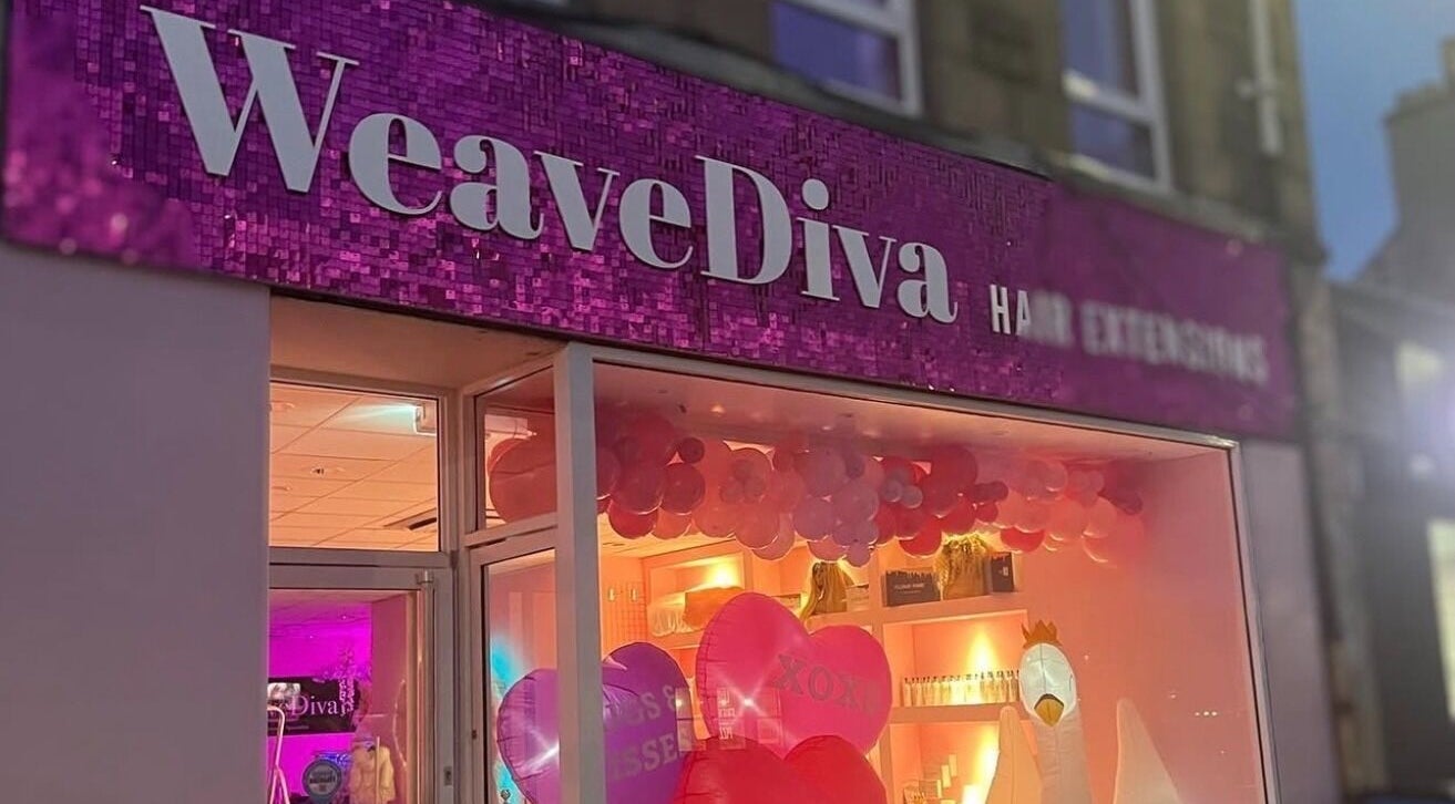 Stacey Shearer Hair in Bathgate, Scotland, GB showcasing a vibrant exterior with pink and purple decor.