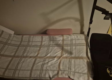 A cozy treatment table at Deborah Jane hair and beauty, Buckfast, England, GB, prepared for client comfort.