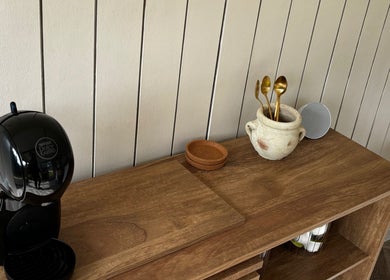 Elegant coffee setup at Mollys Nail Studio, Bridgend, Wales, GB with chic wooden decor.