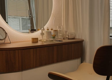 Elegant vanity setup at With love, Christi in Düsseldorf, Nordrhein-westfalen, DE, featuring beauty essentials.
