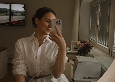Woman taking selfie in cozy room at With love, Christi, Düsseldorf, Nordrhein-westfalen, DE.