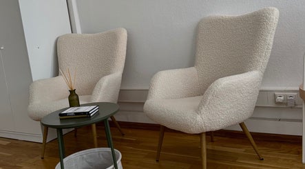Chic seating area with plush chairs at With Love, Christie, Düsseldorf, Nordrhein-Westfalen, DE.