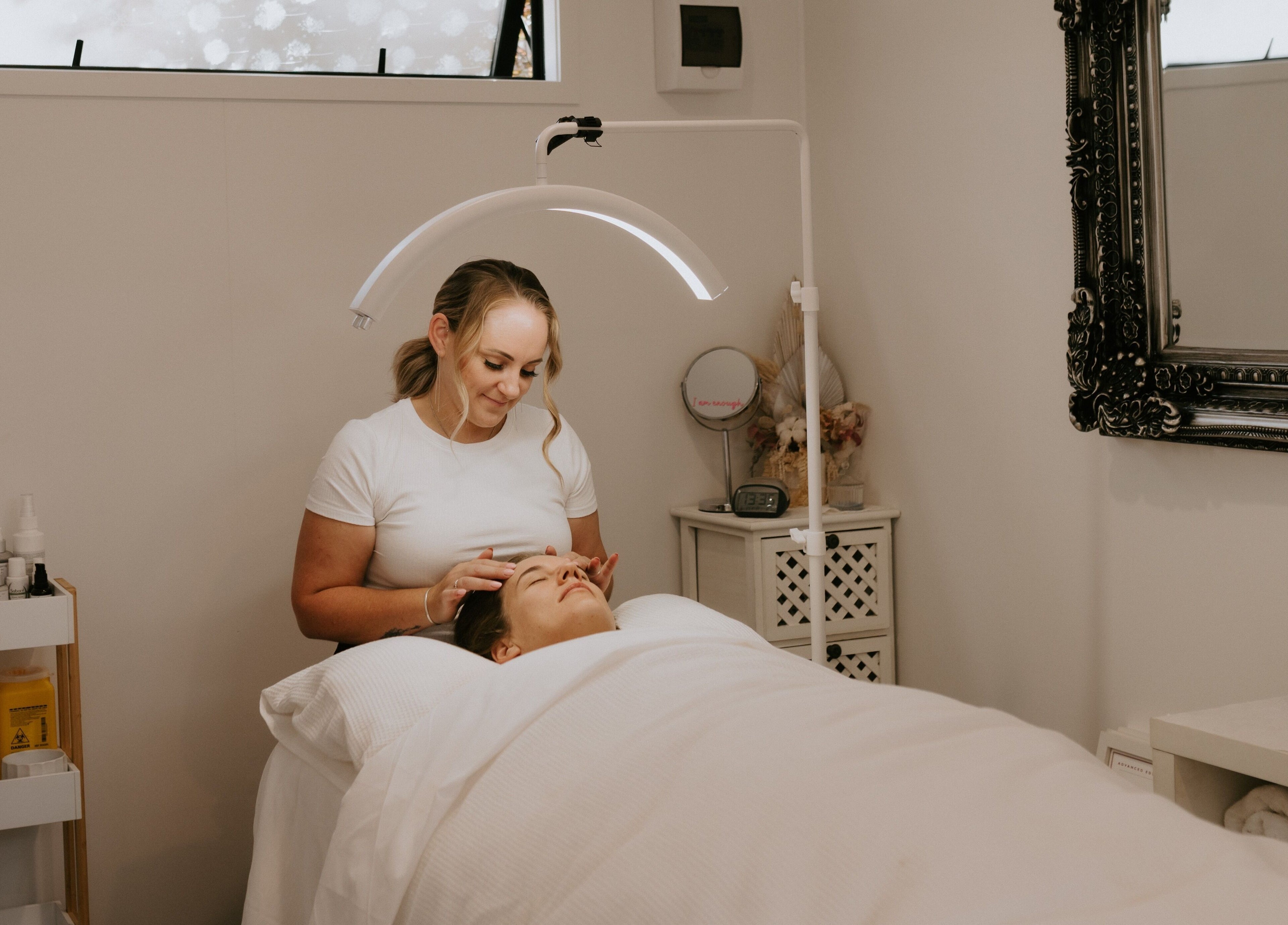Therapist giving a relaxing facial at Fuchsia Beauty Therapy, Nelson, Nelson, NZ.